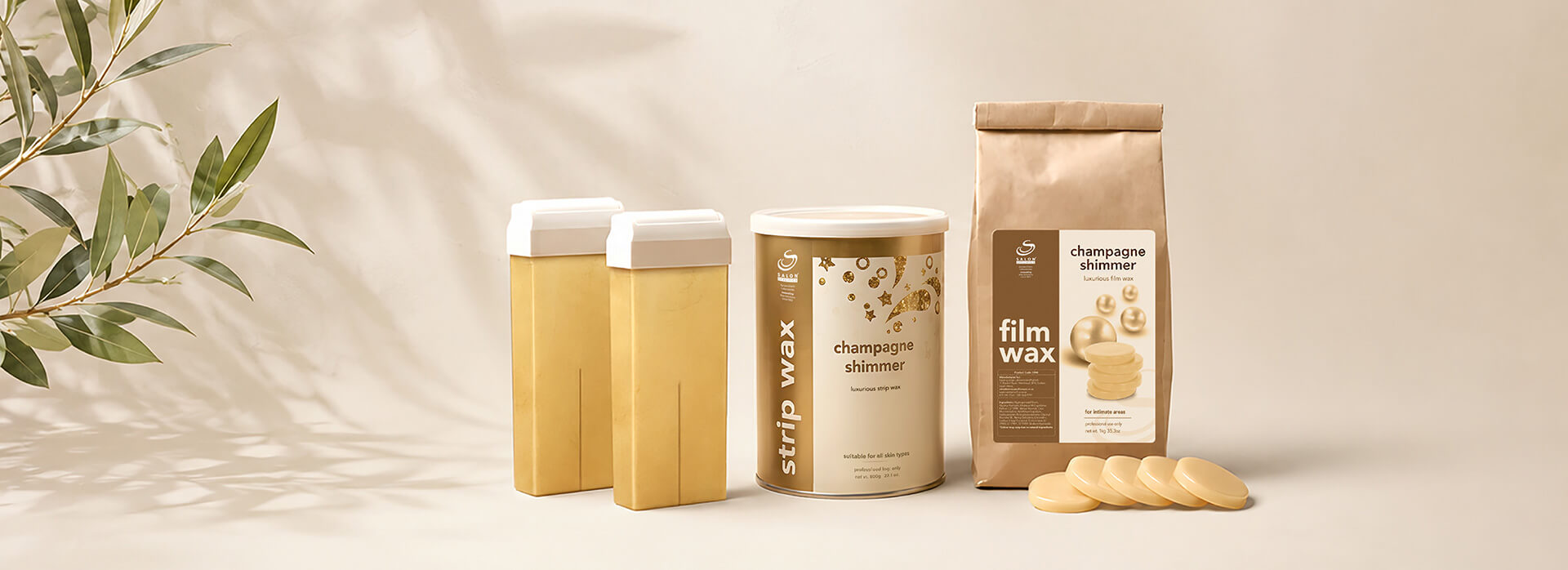 Assorted waxing products on a beige surface: two tall beige boxes, a 'strip wax' can, a 'champagne shimmer' tin, a 'film wax' bag, and several wax disks nearby.